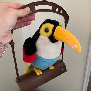 Talking toucan hanging kids toy
